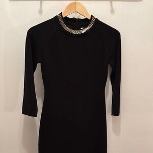 Black Dress with Gold Chain Detail